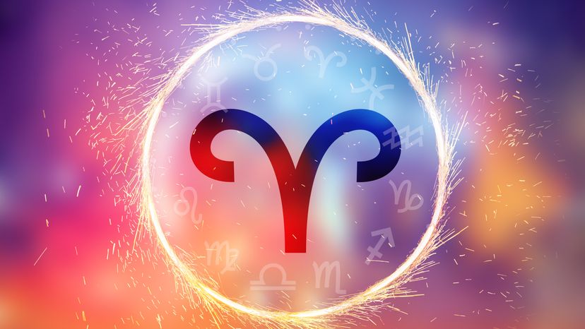 An Aries symbol on a colorful bright background. 