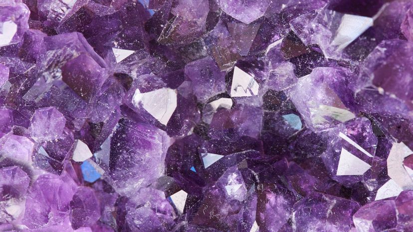 A close up image of purple precious stones. 
