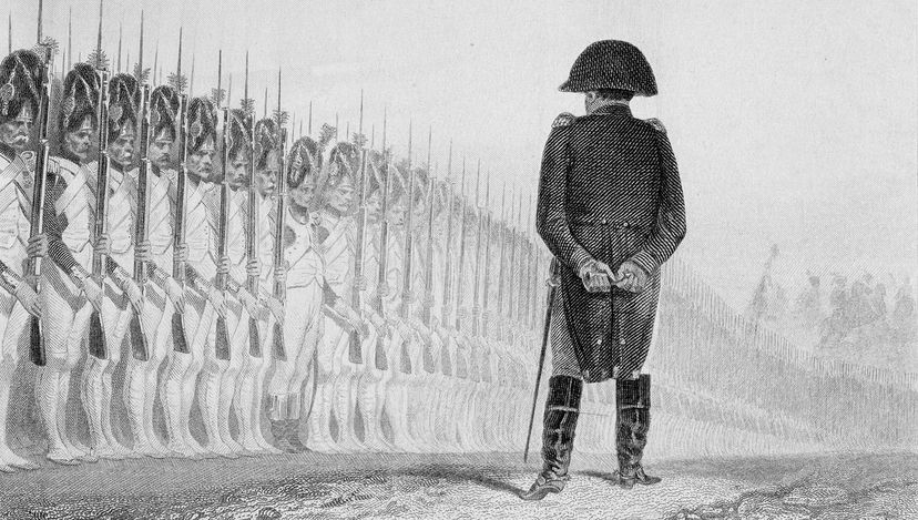 Napoleon standing before line of soldiers