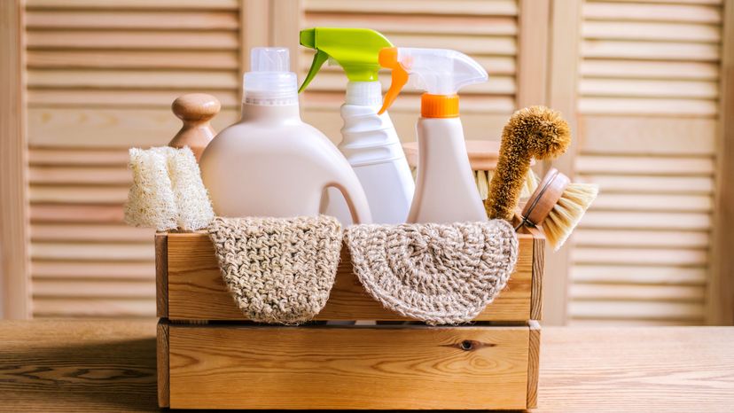 Cleaning supplies in a basket. 