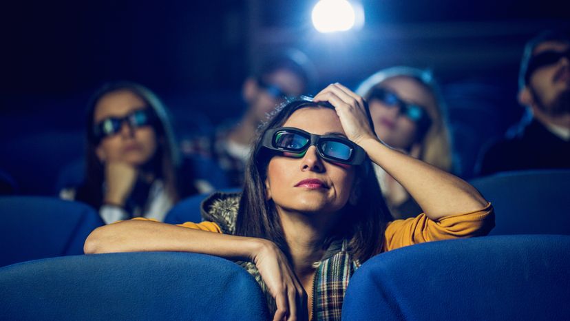 A bored woman at the local cinema 