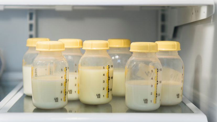 An image showing feeding bottles containing milk.