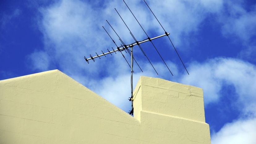 An antenna mounted on a rooftop. 