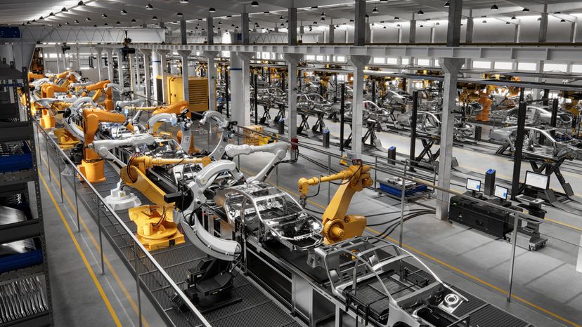 Top view of skeleton cars on a production line. 