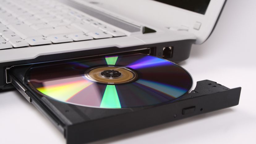 Laptop with loaded disc drive.