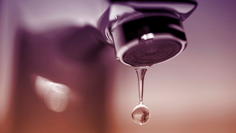 Dripping faucet close-up