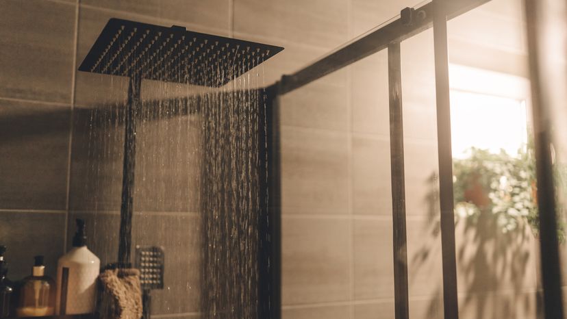 Close up image of water flowing from a shower head. 