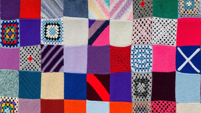A multicolored knitted patchwork. 