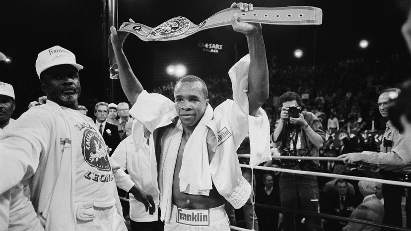  Sugar Ray Leonard holding championship belt