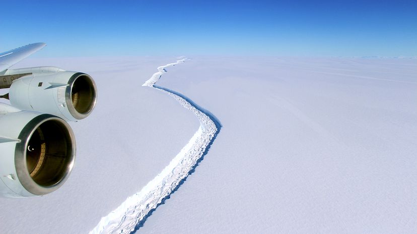 This massive rift in the Larsen C ice shelf, pictured here in November 2016, created a historically large iceberg that calved off from the ice shelf around July 11, 2017. The area to the right of the crack is now afloat in the sea. John Sonntag/NASA
