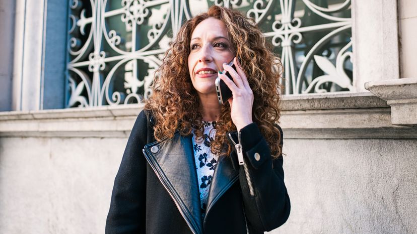 A woman talking on her cell phone. 