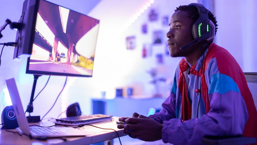 A young boy playing a video game. 