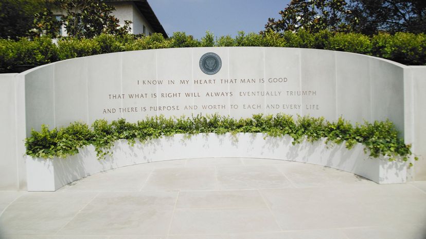 A tombstone with a quote from Ronald Reagan. 