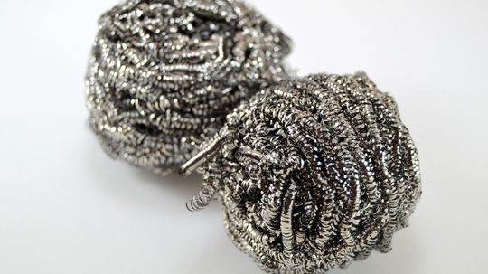 How do you use steel wool for sanding?