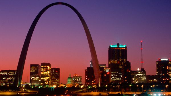 Nighttime cityscape of famous Gateway Arch.