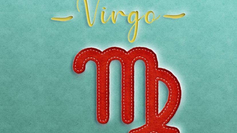 A Virgo sign drawn on a green background. 