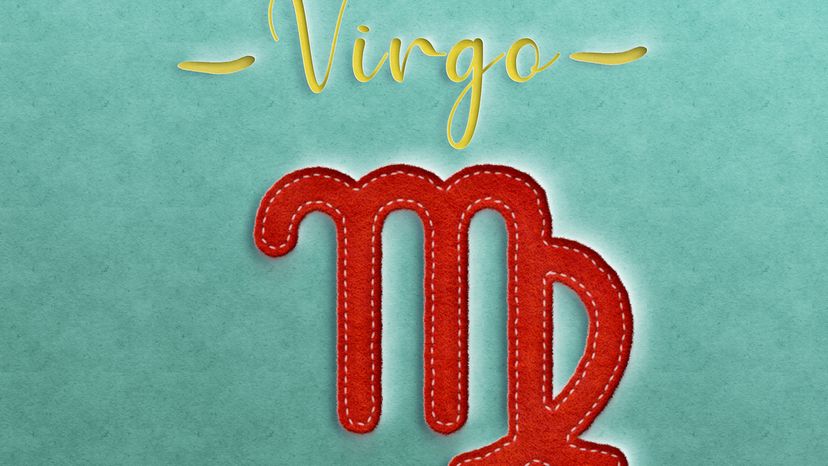 A Virgo sign drawn on a green background.