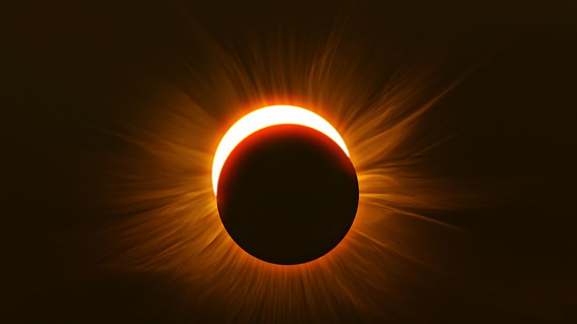 A picture of the moon covering the sun during a solar eclipse. 