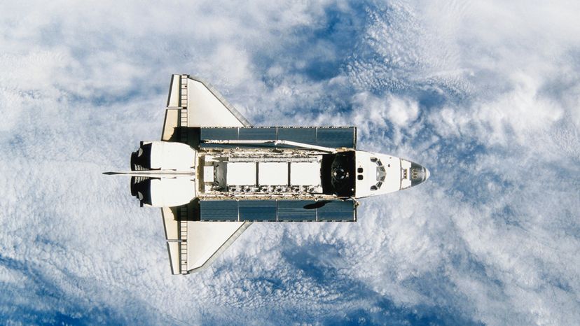 A space shuttle in space. 