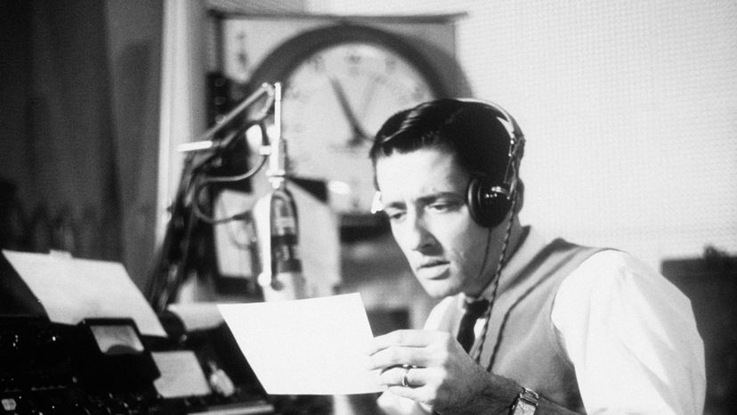 A man in a radio station. 