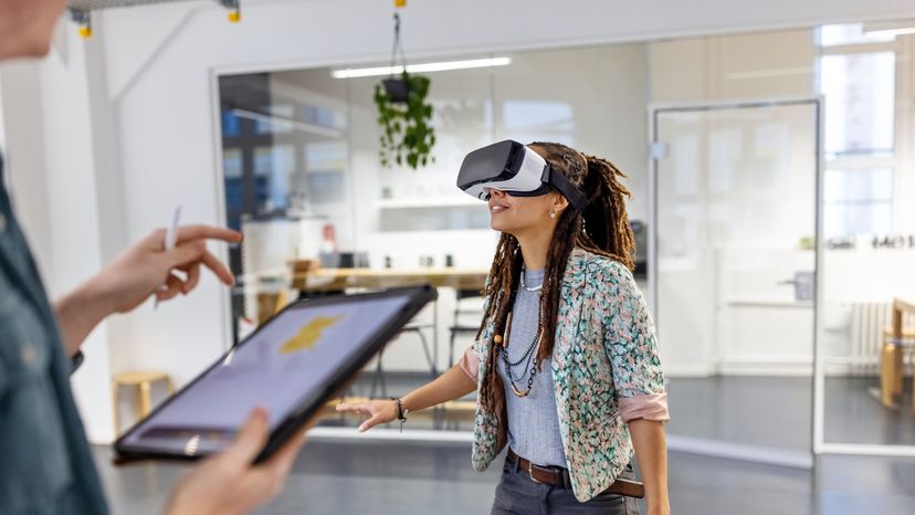 A young woman wearing a VR headset.