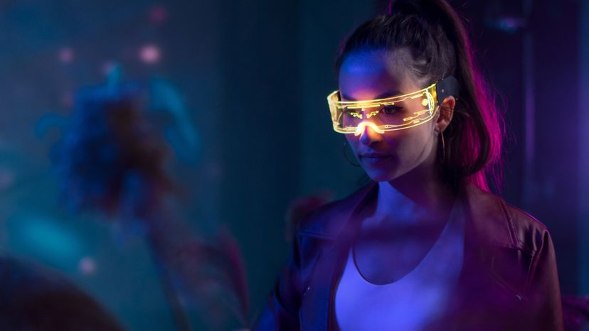 A woman wearing a futuristic smart glass in a VR environment. 