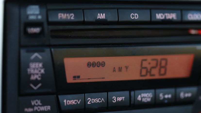 A car radio displaying a stations code. 