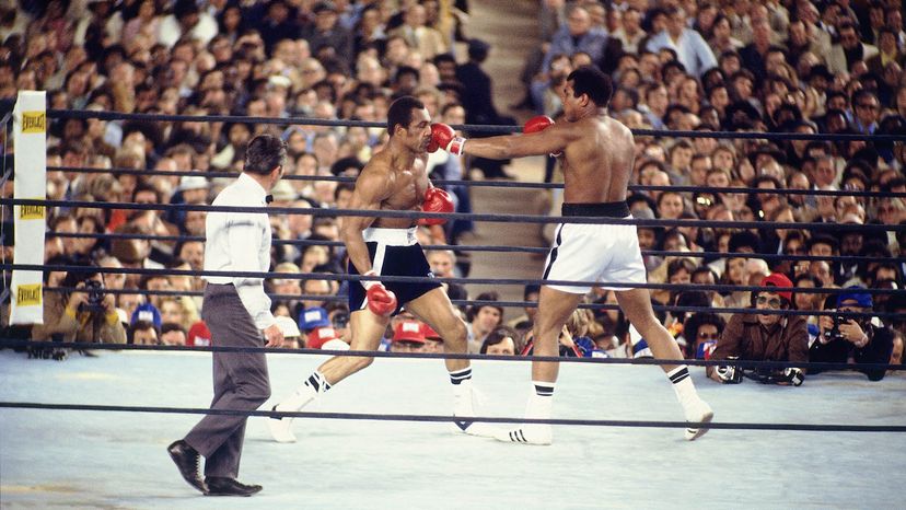 Muhammad Ali and C.J. Glove Up for Louis Vuitton