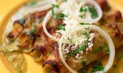 Mushroom soup adds flavor to these enchiladas.