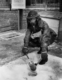 Scottis­h police officer all suited up to handle mustard gas