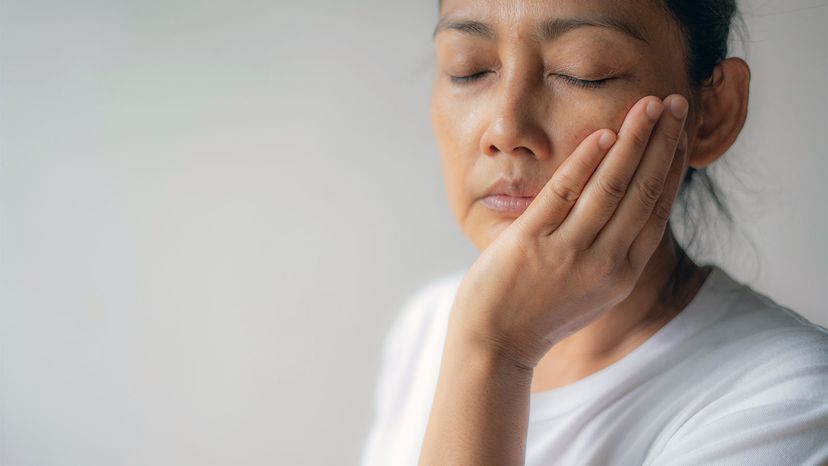 woman with jaw pain