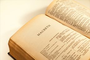 book open to Shakespeare's Macbeth