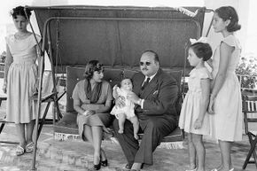 Egypt's deposed King Farouk posed with his family on the Isle of Capri where he was in exile, in 1953.