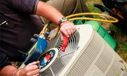 man repairing air conditioner