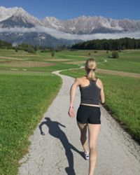 Woman outdoors, alone.