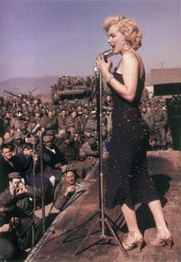 The temperatures in Korea were bitter cold during the four days Marilyn performed, but she said later that she felt only the warmth of the adoring soldiers.