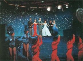 As this image suggests, There's No Business Like Show Business is colorful, splashy ... and trivial. From left, Johnnie Ray, Mitzi Gaynor, Dan Dailey, Ethel Merman, Donald O'Connor, and Marilyn.