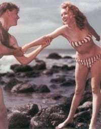 A bikini swimsuit of the type Norma Jeane wears here was quite rare on the nation's beaches at the time.