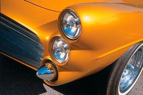 The front end of the Marquis features Lucas headlights and bullet bumperettes.