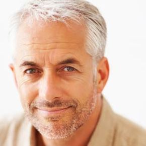 Mature gentleman smiling.