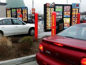Modern drive-thrus incorporate displays to verify orders and some even have two order stations to speed up the process.