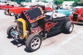 The Street Rodder staff's version of the McMullen Deuce in a 2002 L.A. Roadster Show. See more hot rod pictures.