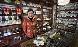 Woman running her own shop. 