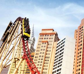 Patrons ride the Manhattan Express at New York New York Hotel and Casino in Las Vegas, Nev.