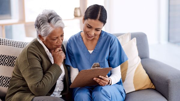 elderly lady with nurse