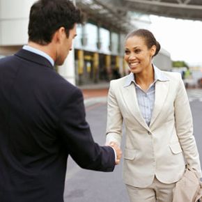 man and woman shaking hands