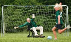grandfather playing goalie