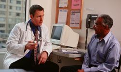 man talking with his doctor