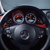 The SLR sports a multifunction steering wheel with F1-style manual gearshift buttons.