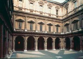 Michelangelo was commissioned to finish theFarnese Palace courtyard in Rome, Italy.